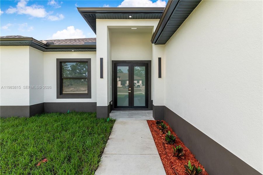 Exterior details and patio area of a home in , Lehigh Acres (Image 3). Exterior details and patio area of a home in , Lehigh Acres (Image 3).