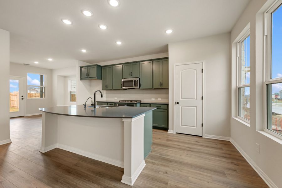 Representative furnished interior of a home built from the Robin by Ashton Woods in The Cottages at Lariat, Liberty Hill (Image 7). Representative furnished interior of a home built from the Robin by Ashton Woods in The Cottages at Lariat, Liberty Hill (Image 7).