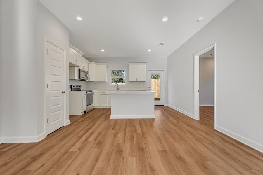 Furnished interior view inside a new home in Live Oak Cottages, Freeport (Image 4).
