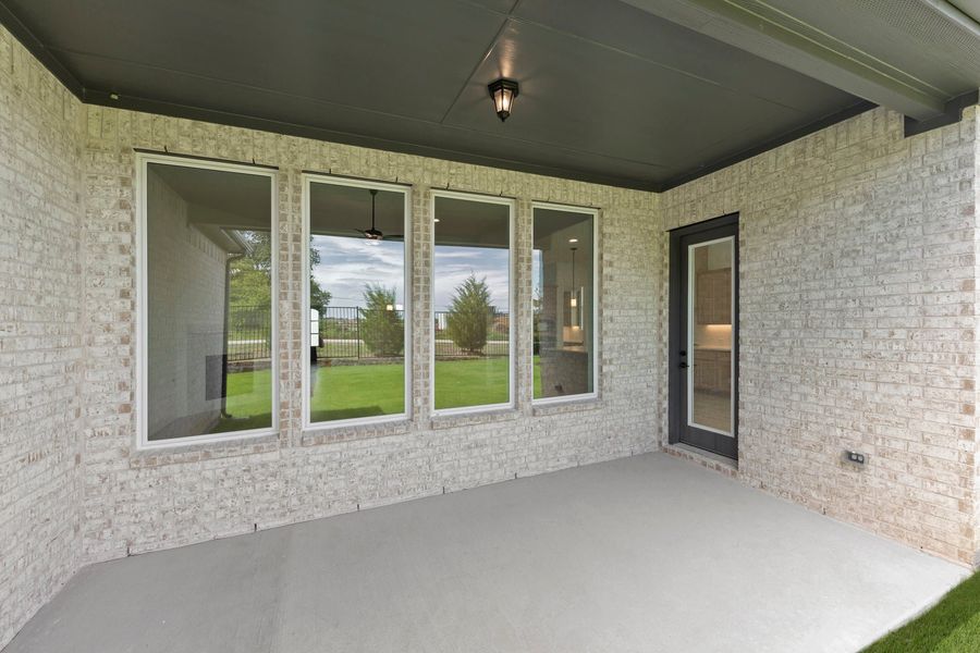 Exterior details and patio area of a home in Nelson Lake Estates, Rockwall (Image 3). Exterior details and patio area of a home in Nelson Lake Estates, Rockwall (Image 3).