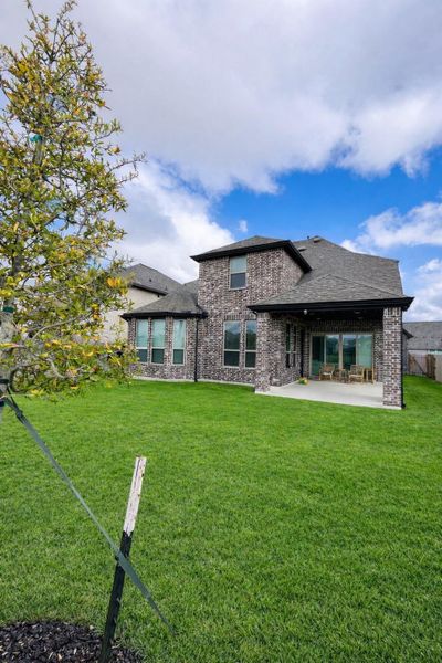 Exterior details and patio area of a home in Elyson, Katy (Image 3).