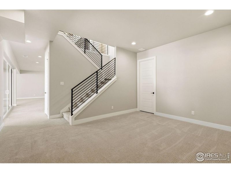 Spacious, unfurnished interior of a new home in The Fairways at RainDance, Windsor (Image 19).