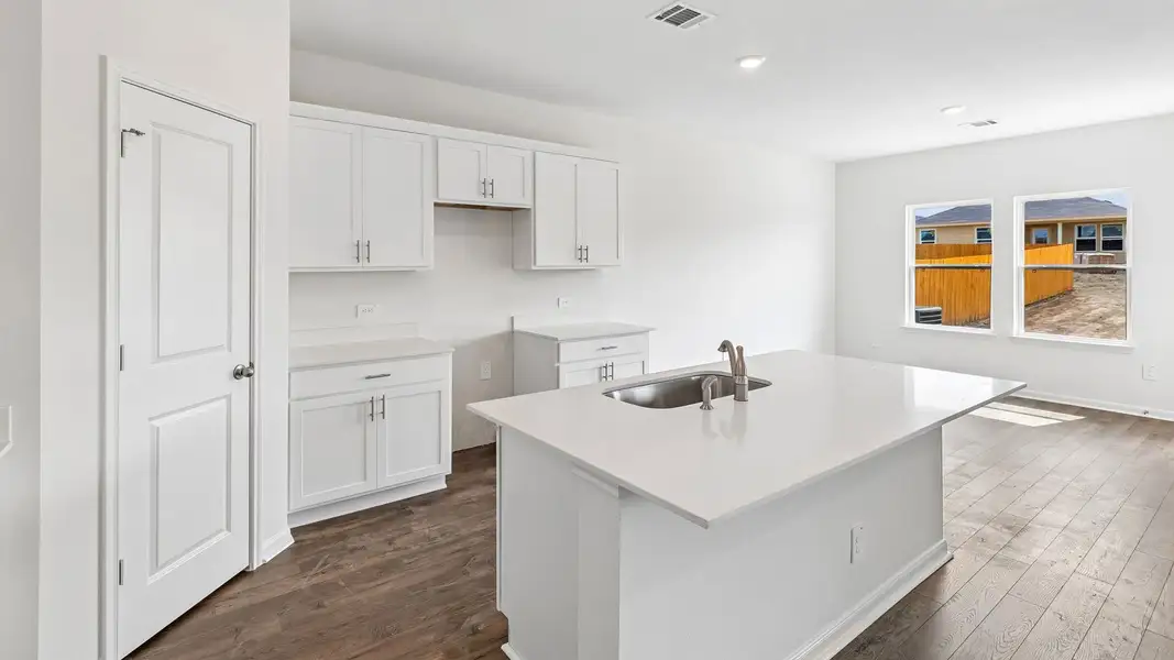 Furnished interior view inside a new home in Prairie Lakes, Buda (Image 7).