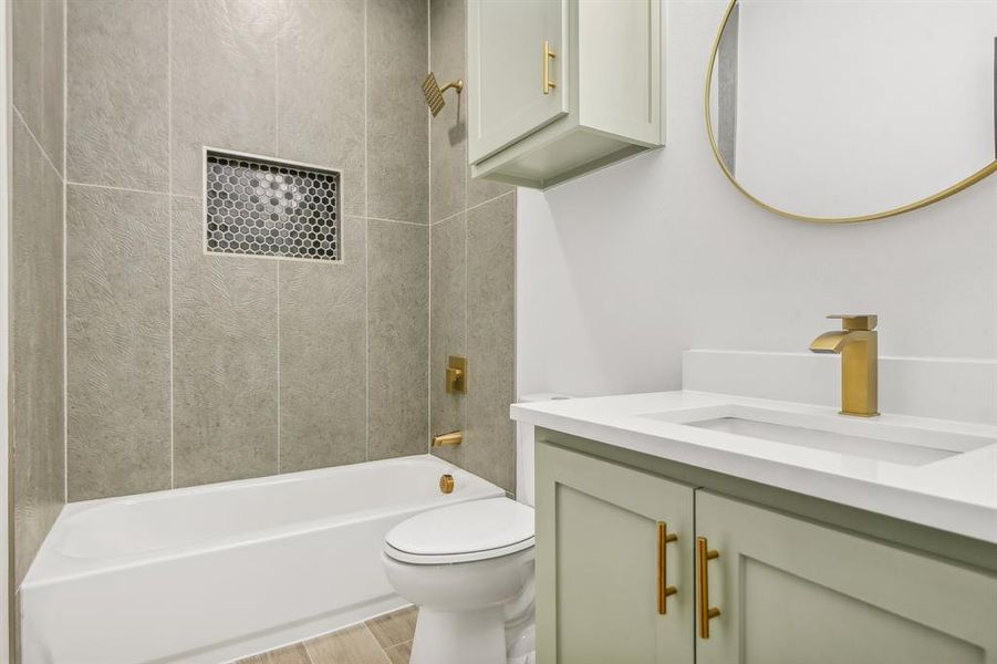 Full bathroom with vanity and bathing tub / shower combination Full bathroom with vanity and bathing tub / shower combination