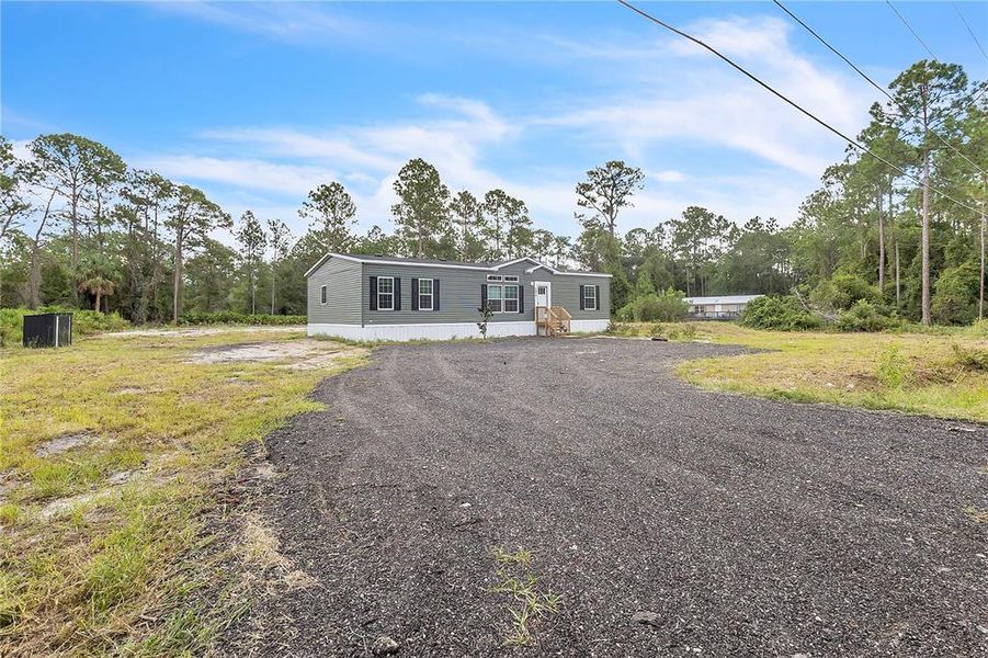 Exterior details and patio area of a home in , Bunnell (Image 21).