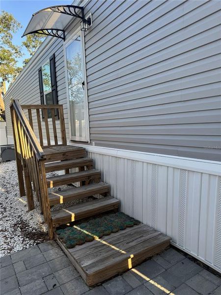 Exterior details and patio area of a home in , Holiday (Image 3). Exterior details and patio area of a home in , Holiday (Image 3).