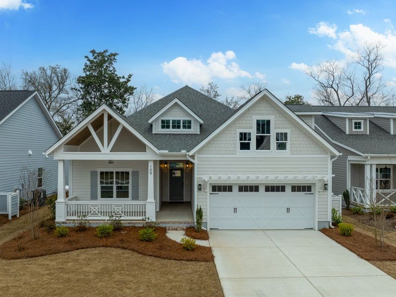 Representative exterior photo of a completed home built from the Kauai by Bill Clark Homes in The Sanctuary at Sunset Beach, Sunset Beach, NC (Image 28).