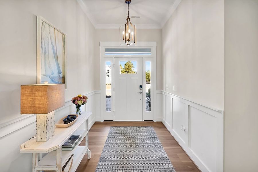 Furnished interior view inside a new home in The Bluffs On the Cape Fear, Leland (Image 5).