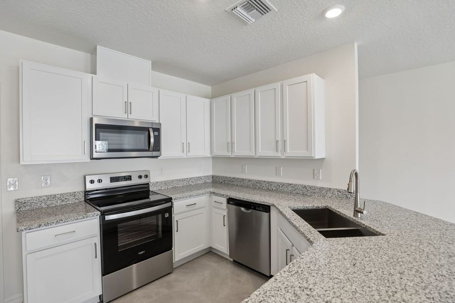 Furnished interior view inside a new home in Reserve at Forest Lake Townhomes, Lake Wales (Image 5). Furnished interior view inside a new home in Reserve at Forest Lake Townhomes, Lake Wales (Image 5).