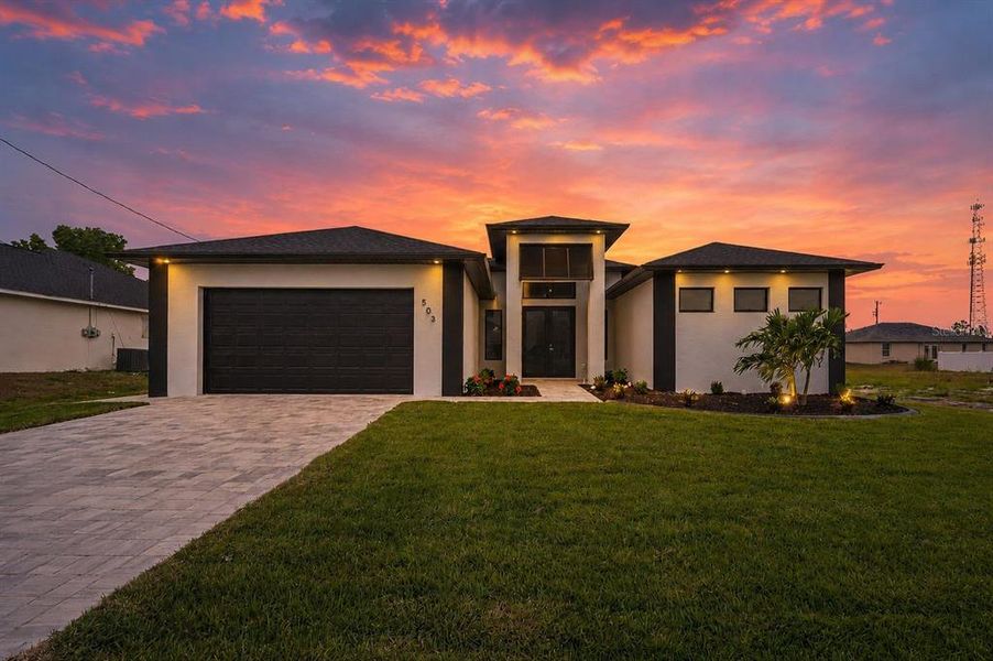 Front exterior of a new home in , Cape Coral, FL, highlighting curb appeal (Image 22).