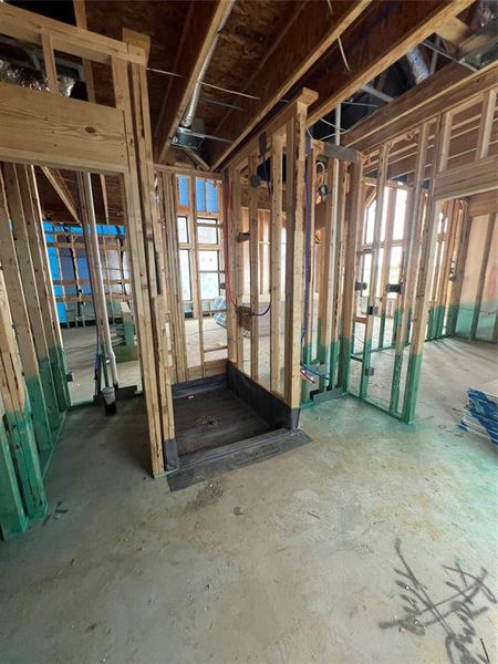 Opposite view of the main bathroom with the glass shower tucked into the wall off of the second vanity. Swipe over to see a representation of this space once completed.