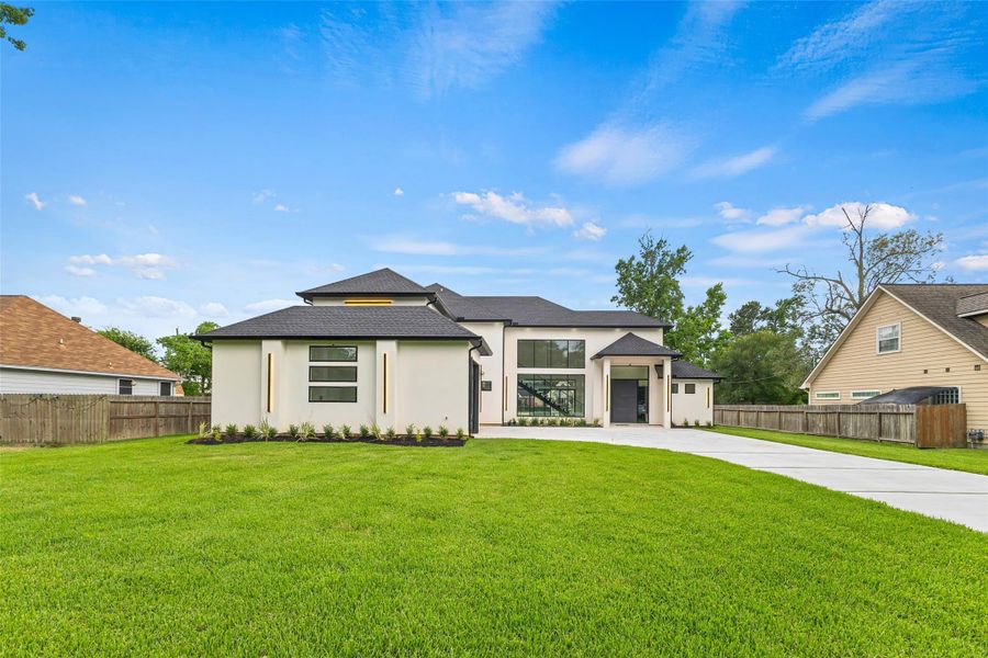 Front exterior of a new home in , Magnolia, TX, highlighting curb appeal (Image 2). Front exterior of a new home in , Magnolia, TX, highlighting curb appeal (Image 2).