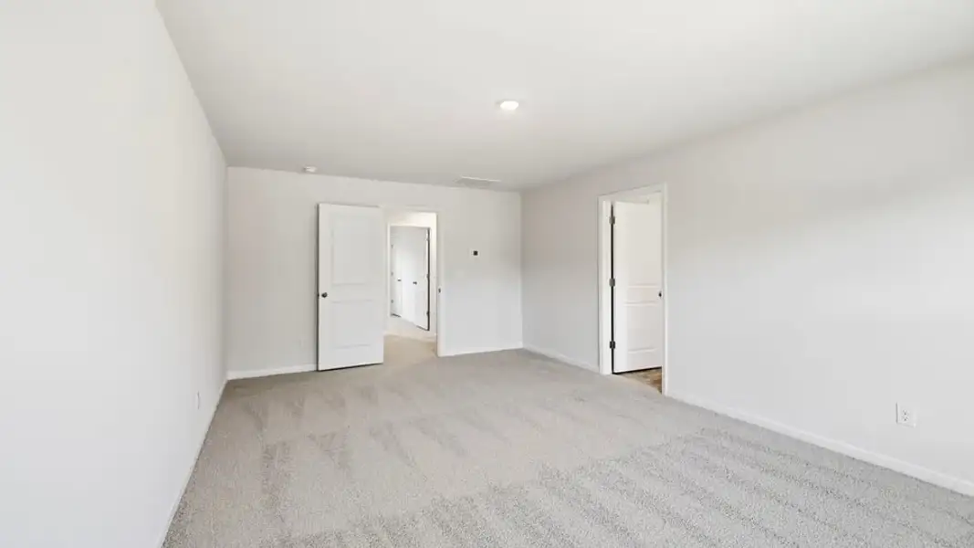 Spacious, unfurnished interior of a new home in Ben Hurt Road, Lyman (Image 36).
