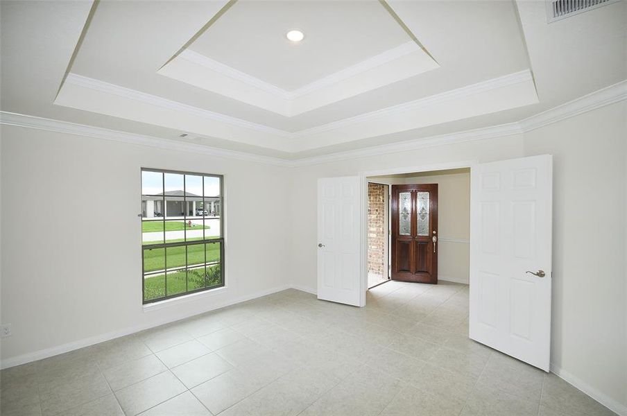 Ceramic Tile flooring and a double custom crafted ceiling in the Dining Room.