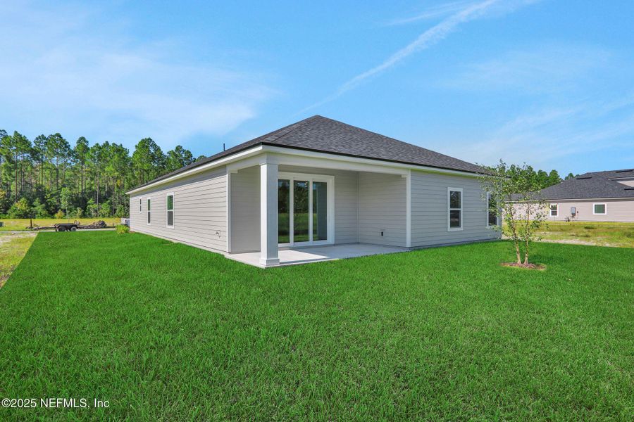 Exterior details and patio area of a home in Brook Forest - Single Family Homes, St. Augustine (Image 19). Exterior details and patio area of a home in Brook Forest - Single Family Homes, St. Augustine (Image 19).