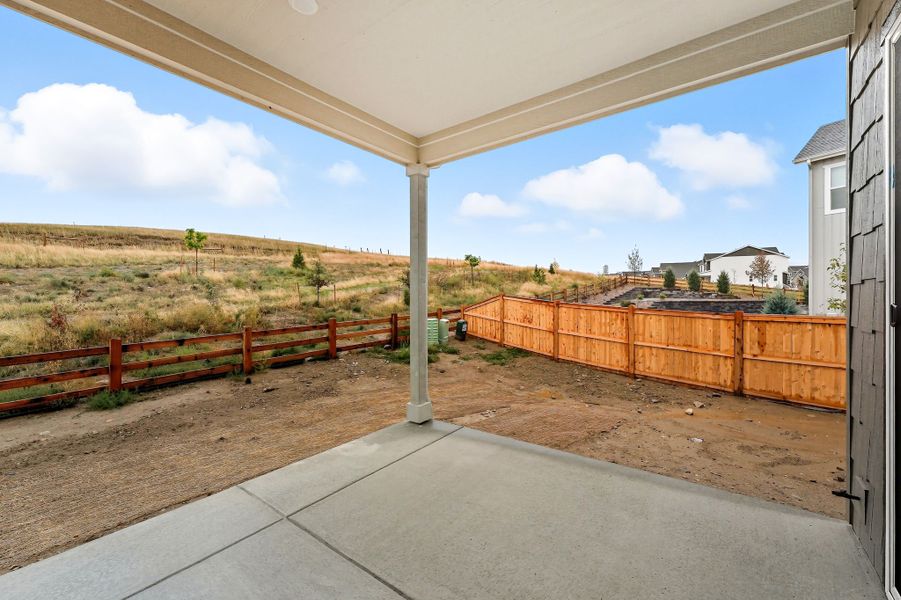 Exterior details and patio area of a home in Trailstone Destination Collection, Arvada (Image 1).