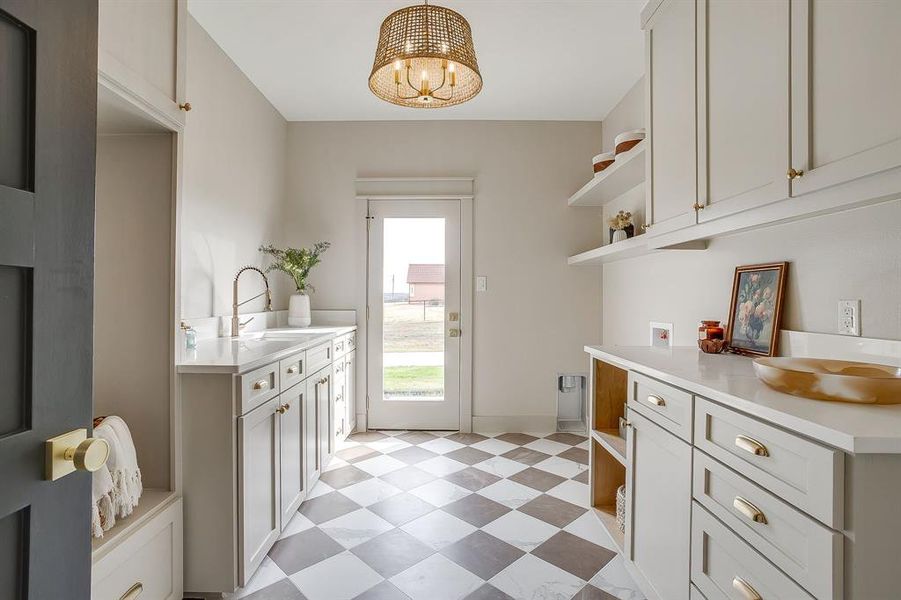 utility room with checkered floor
