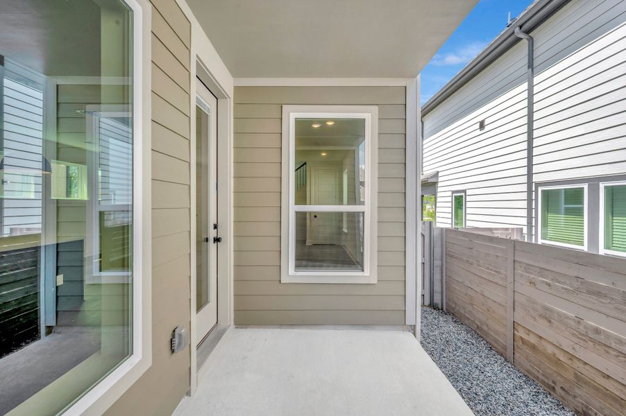 Exterior details and patio area of a home in Painted Tree Woodland West – Cottages, McKinney (Image 3). Exterior details and patio area of a home in Painted Tree Woodland West – Cottages, McKinney (Image 3).