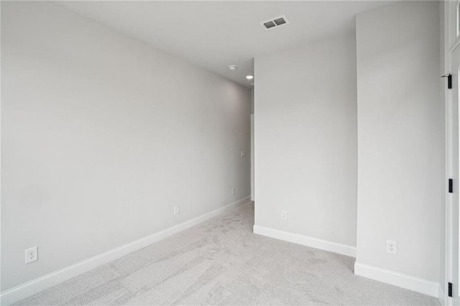 Spacious, unfurnished interior of a new home in Ward's Crossing Townhomes, Johns Creek (Image 20).