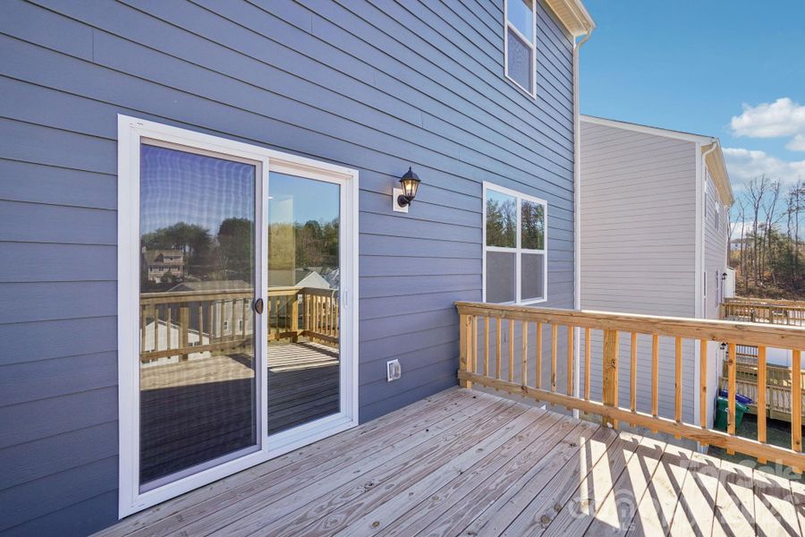 Exterior details and patio area of a home in Rydele Heights, Asheville (Image 17). Exterior details and patio area of a home in Rydele Heights, Asheville (Image 17).
