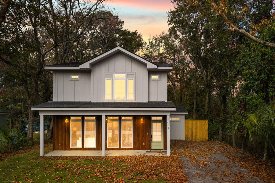 Front exterior of a new home in , Charleston, SC, highlighting curb appeal (Image 1). Front exterior of a new home in , Charleston, SC, highlighting curb appeal (Image 1).