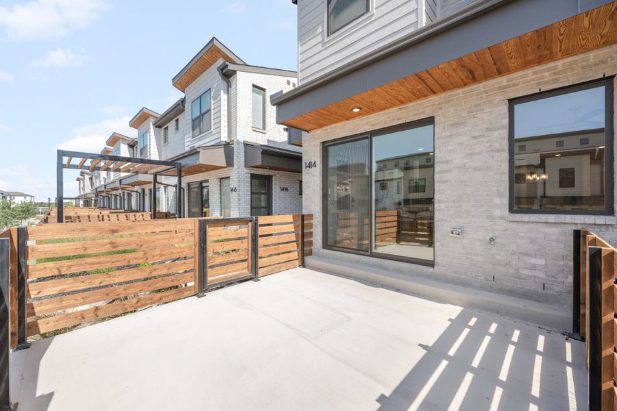 Exterior details and patio area of a home in Willow Grove Townhomes, Melissa (Image 4).