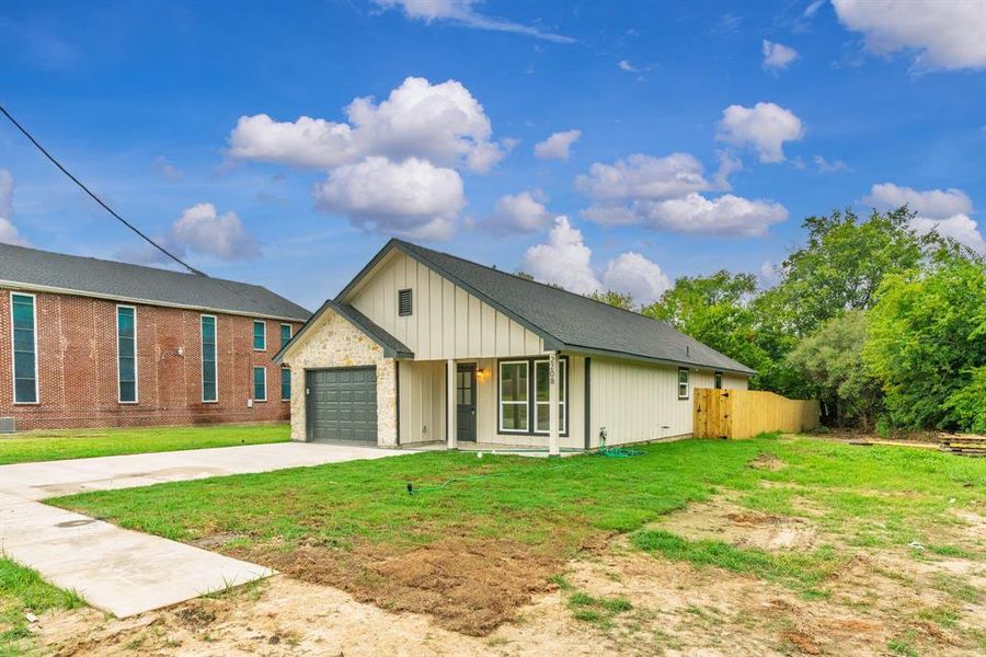 Front exterior of a new home in , Greenville, TX, highlighting curb appeal (Image 18). Front exterior of a new home in , Greenville, TX, highlighting curb appeal (Image 18).