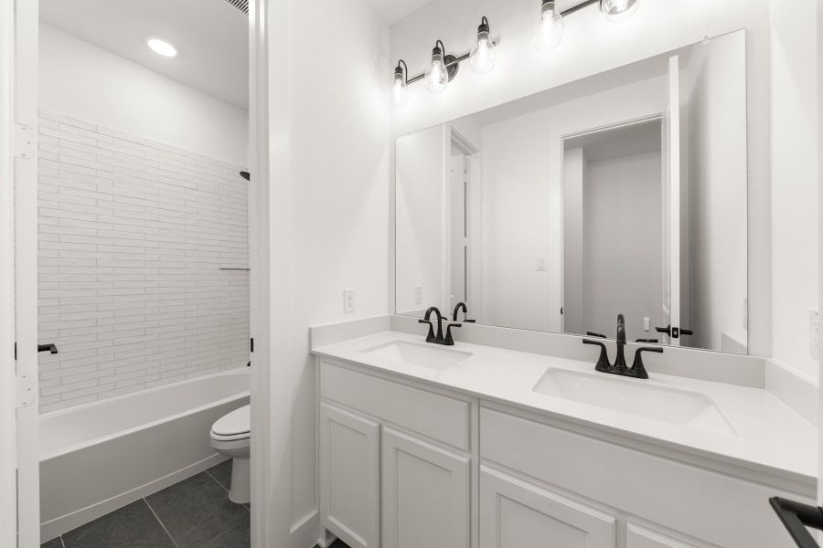 Furnished interior view inside a new home in Union Park, Little Elm (Image 11).