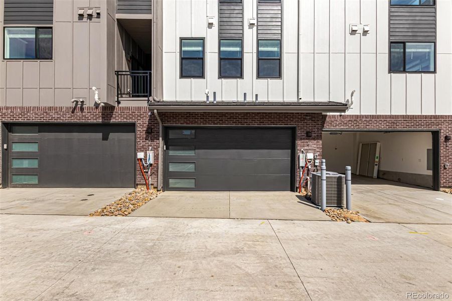 Front exterior of a new home in Ascent at Inverness, Englewood, CO, highlighting curb appeal (Image 17).