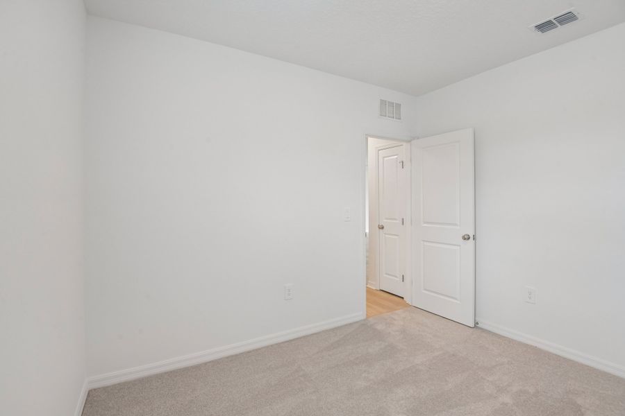 Representative unfurnished interior of a home built from the Blackbird by Taylor Morrison in Westview Community Group Page, Kissimmee (Image 12).