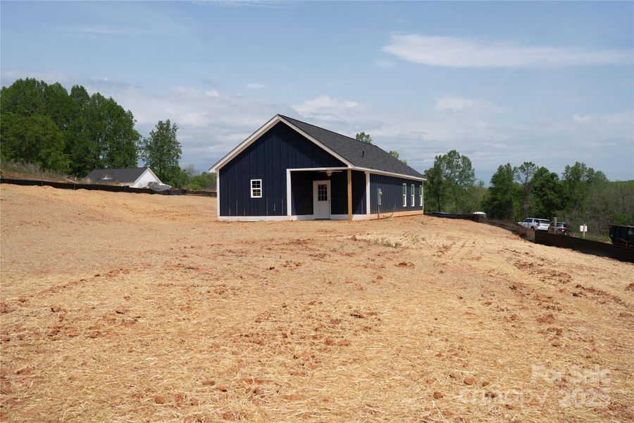 Front exterior of a new home in , Clover, SC, highlighting curb appeal (Image 17).