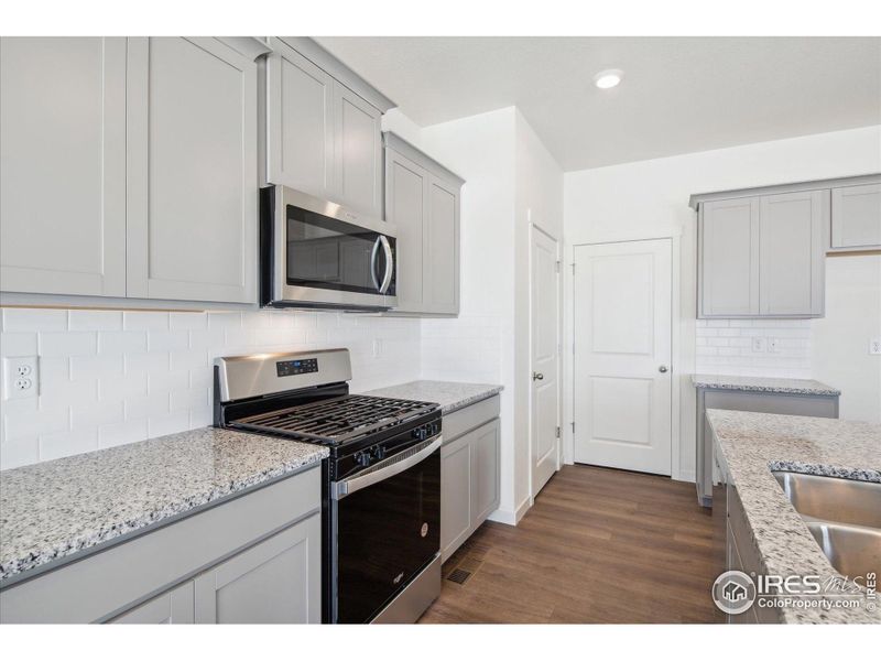 Furnished interior view inside a new home in Westgate, Greeley (Image 11).