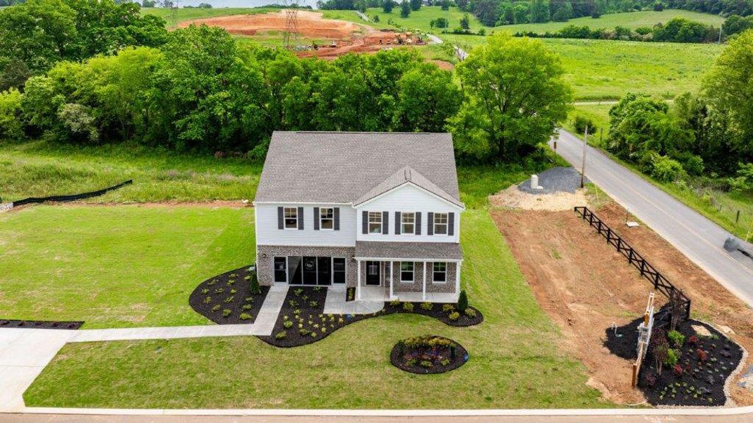 Front exterior of a new home in Sweet Briar, Ooltewah, TN, highlighting curb appeal (Image 2).