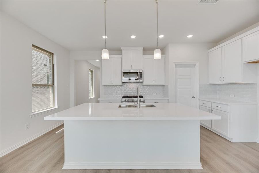 Furnished interior view inside a new home in Spiritas Ranch, Little Elm (Image 7). Furnished interior view inside a new home in Spiritas Ranch, Little Elm (Image 7).