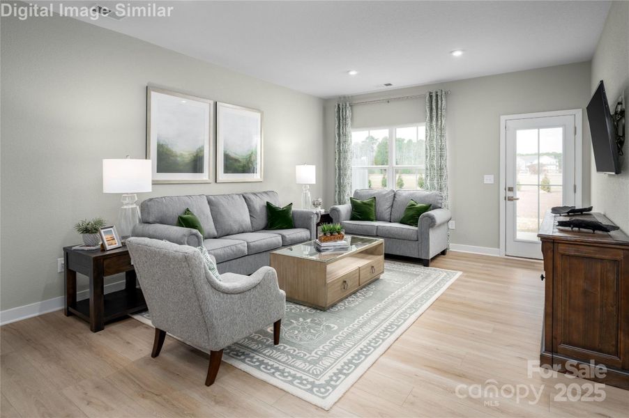 Get ready for cozy nights and effortless entertaining in this light-filled great room with open-concept flow and direct access to your own private patio. Whether it’s movie night or morning coffee, this space wraps you in comfort and connection—where every moment feels like home, and every corner invites you to stay.