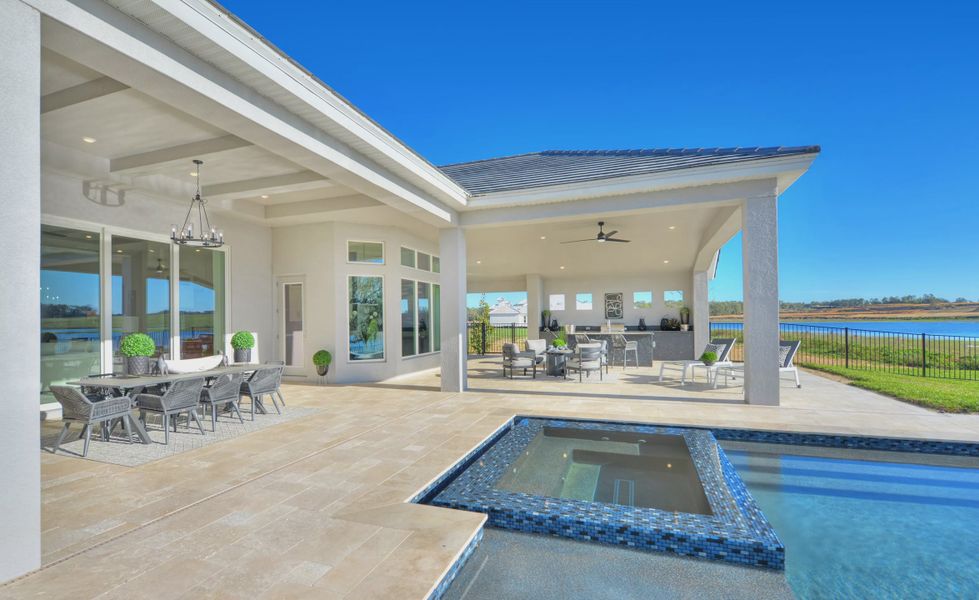 Exterior details and patio area of a home in West Hill Estates, Dade City (Image 24).