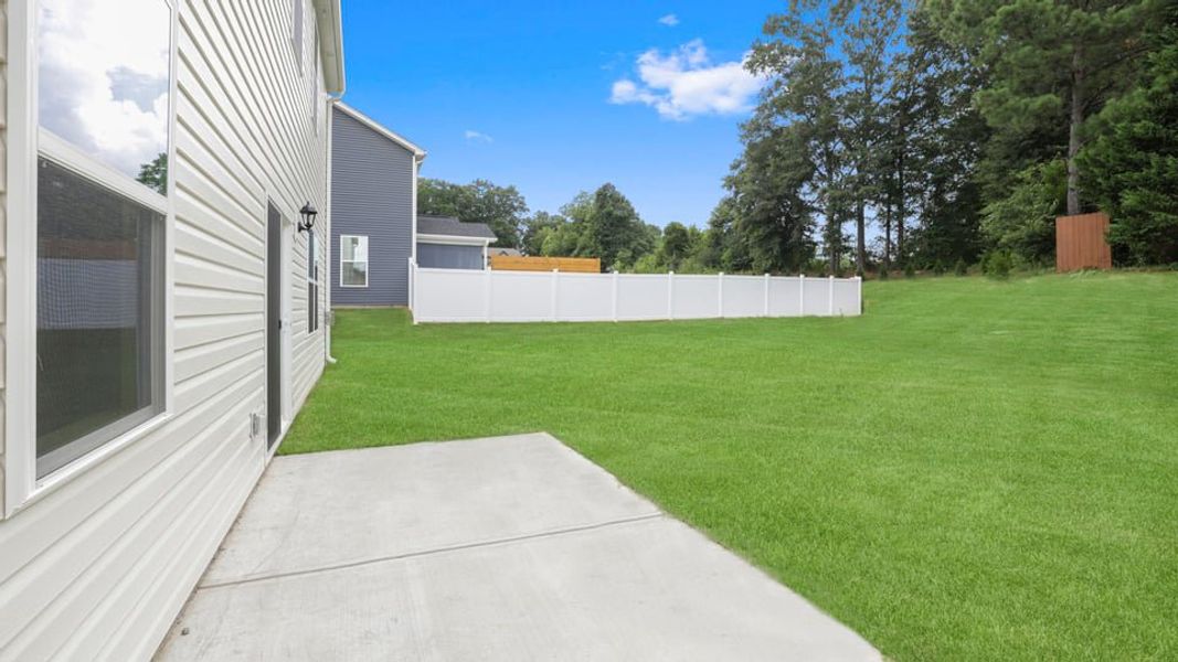 Exterior details and patio area of a home in Palmetto Valley, Anderson (Image 23).