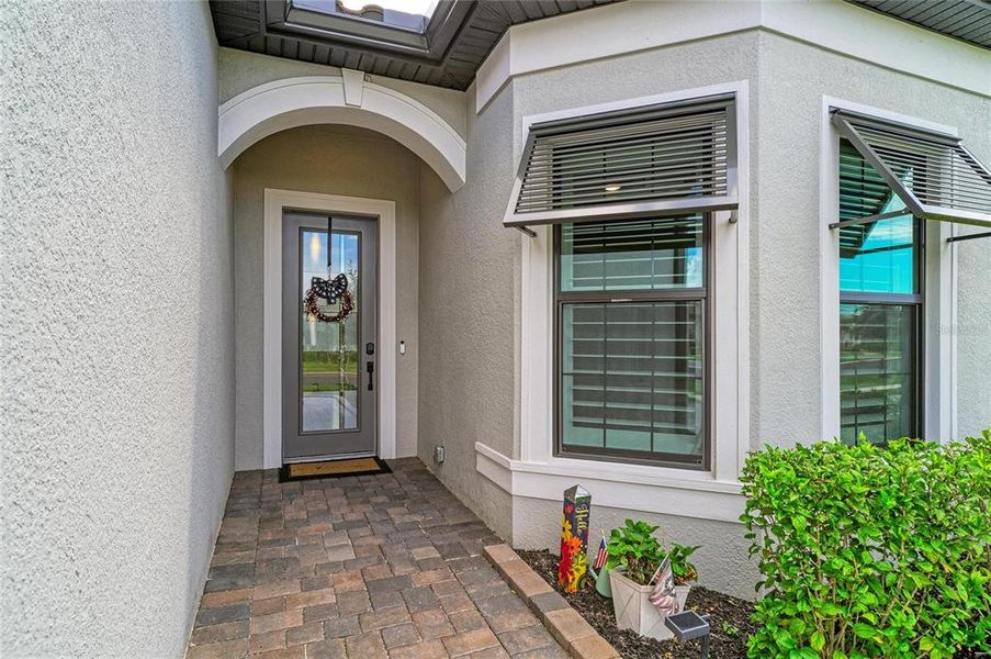 Exterior details and patio area of a home in , Nokomis (Image 29).