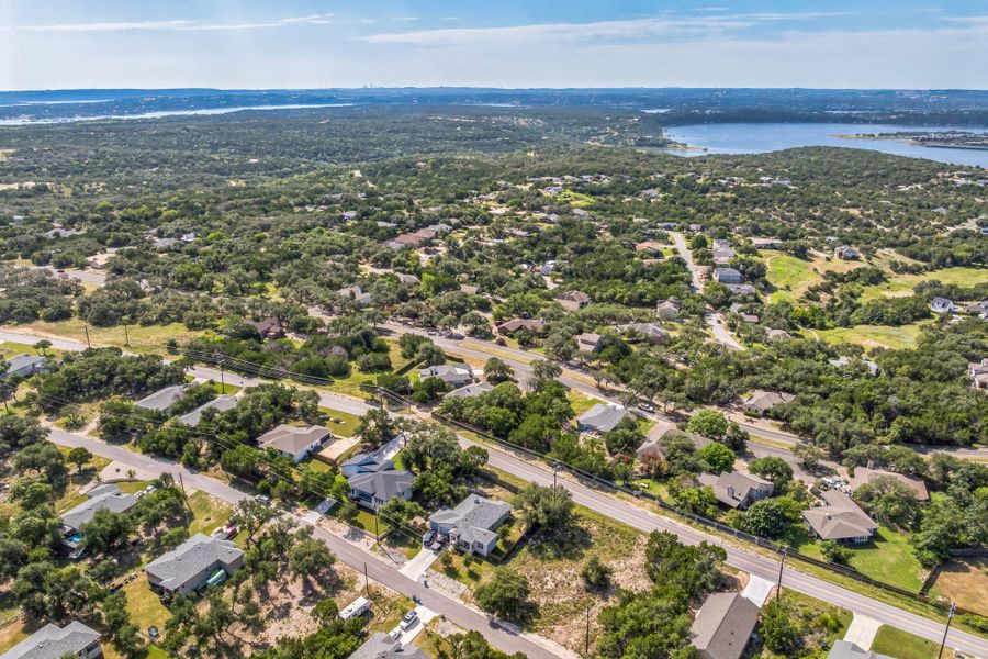 Aerial view of residential area with a nearby body of water