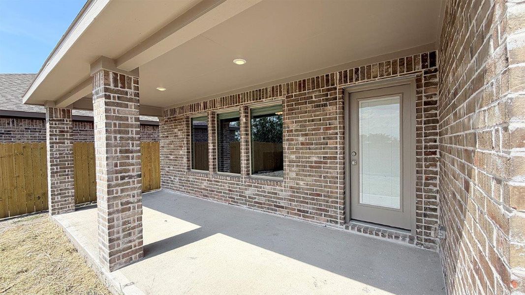 Exterior details and patio area of a home in The Lakes Northwest, Corpus Christi (Image 2). Exterior details and patio area of a home in The Lakes Northwest, Corpus Christi (Image 2).