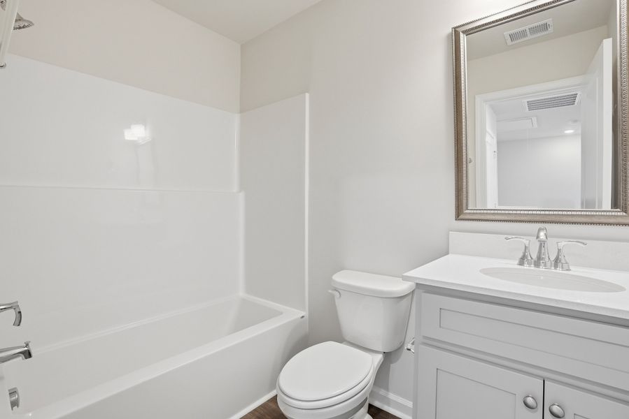Representative furnished interior of a home built from the Aspen 3 Exterior by McGuinn Homes in Liberty Village, Hinesville (Image 30).