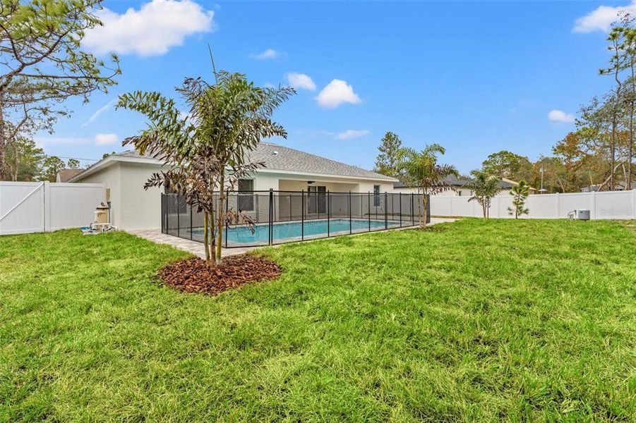 Exterior details and patio area of a home in , Brooksville (Image 31). Exterior details and patio area of a home in , Brooksville (Image 31).