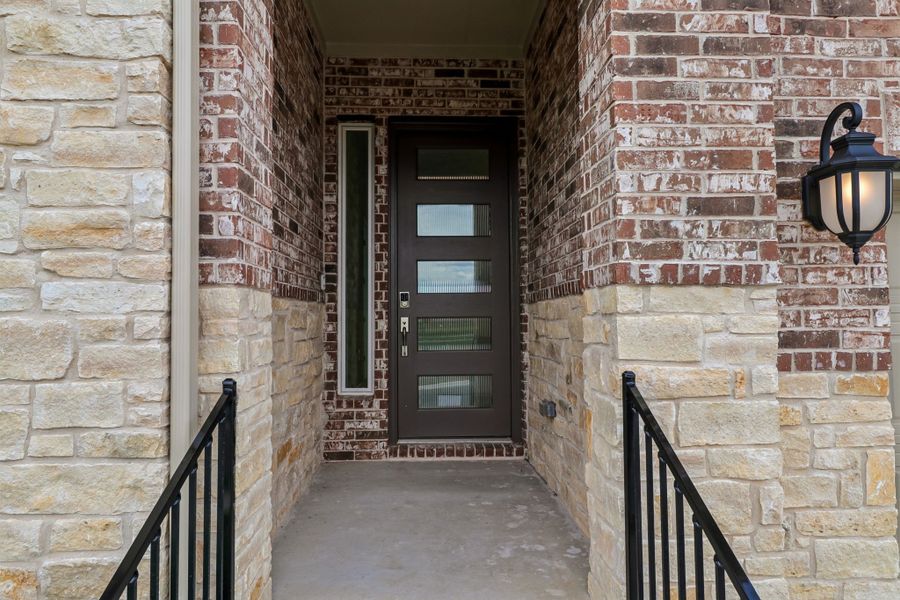 Exterior details and patio area of a home in Silverleaf, Cedar Creek (Image 21).
