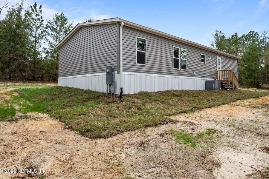 Exterior details and patio area of a home in , Hawthorne (Image 17).