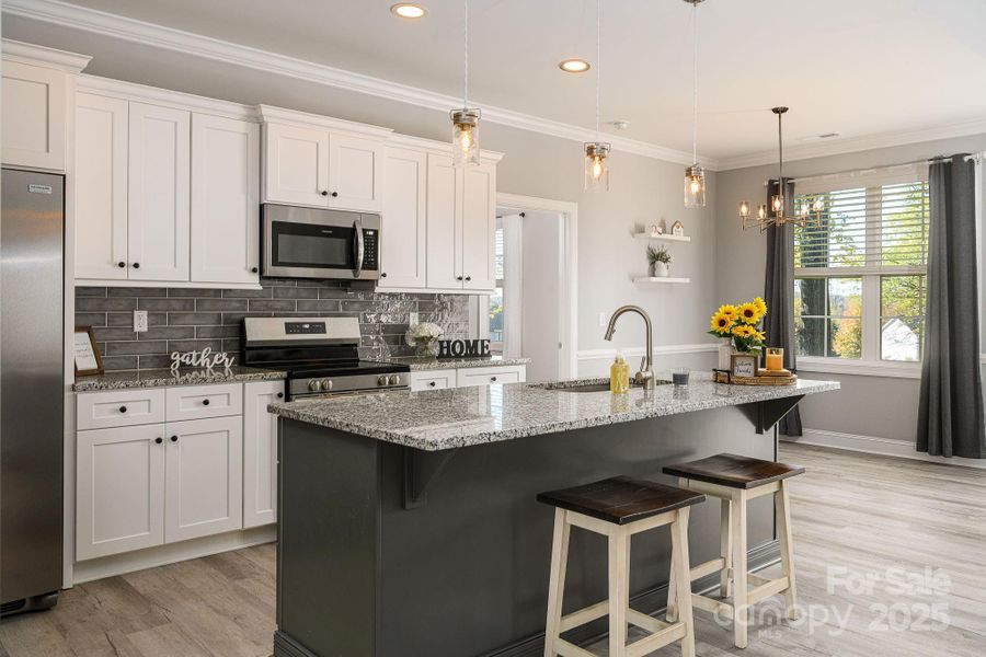 Gorgeous kitchen with granite countertops and stainless steel appliances