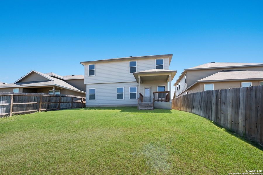 Front exterior of a new home in Laurel Vistas, San Antonio, TX, highlighting curb appeal (Image 27). Front exterior of a new home in Laurel Vistas, San Antonio, TX, highlighting curb appeal (Image 27).
