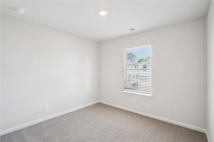 Spacious, unfurnished interior of a new home in Hawthorne Station, College Park (Image 21).