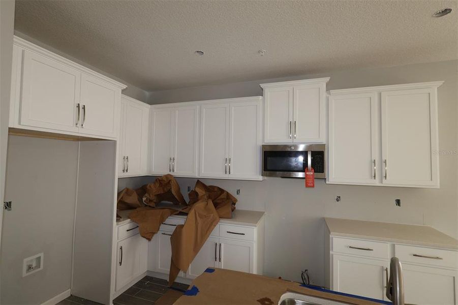 Furnished interior view inside a new home in Emerson Pointe, Apopka (Image 7). Furnished interior view inside a new home in Emerson Pointe, Apopka (Image 7).