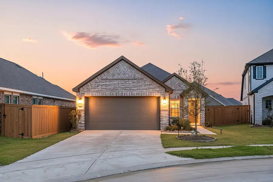 Front exterior of a new home in Marvida, Cypress, TX, highlighting curb appeal (Image 2).