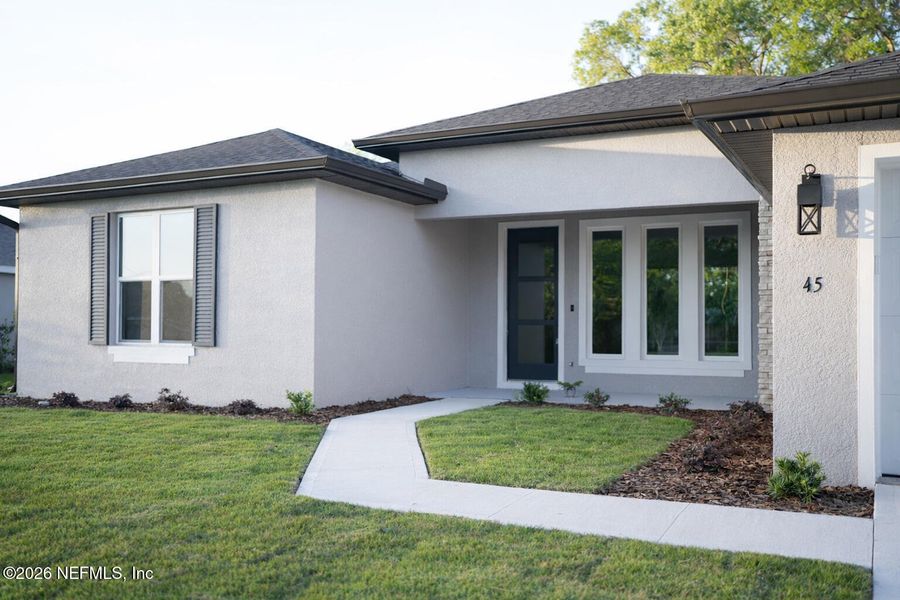 Exterior details and patio area of a home in , Palm Coast (Image 25).